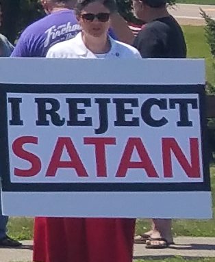 call_protest_growing_treat_satanism
