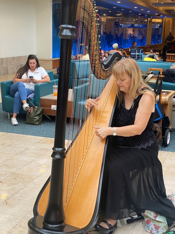 The Harpist in Orlando’s Airport…Only in America